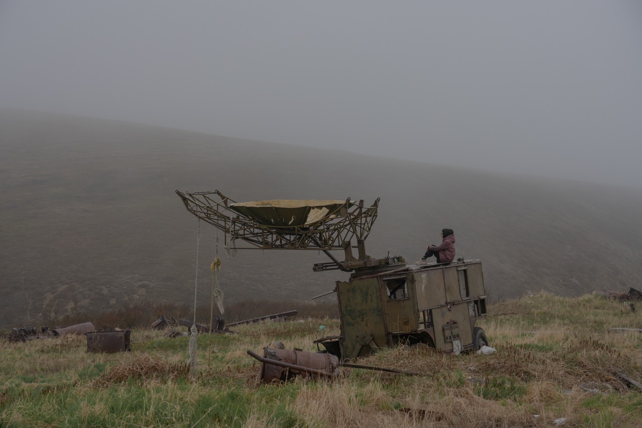Groß (7 - A boy sits on a destroyed radar- Alkatvaam- Chukotka - faa32078-0457-41c2-83fc-4.jpeg