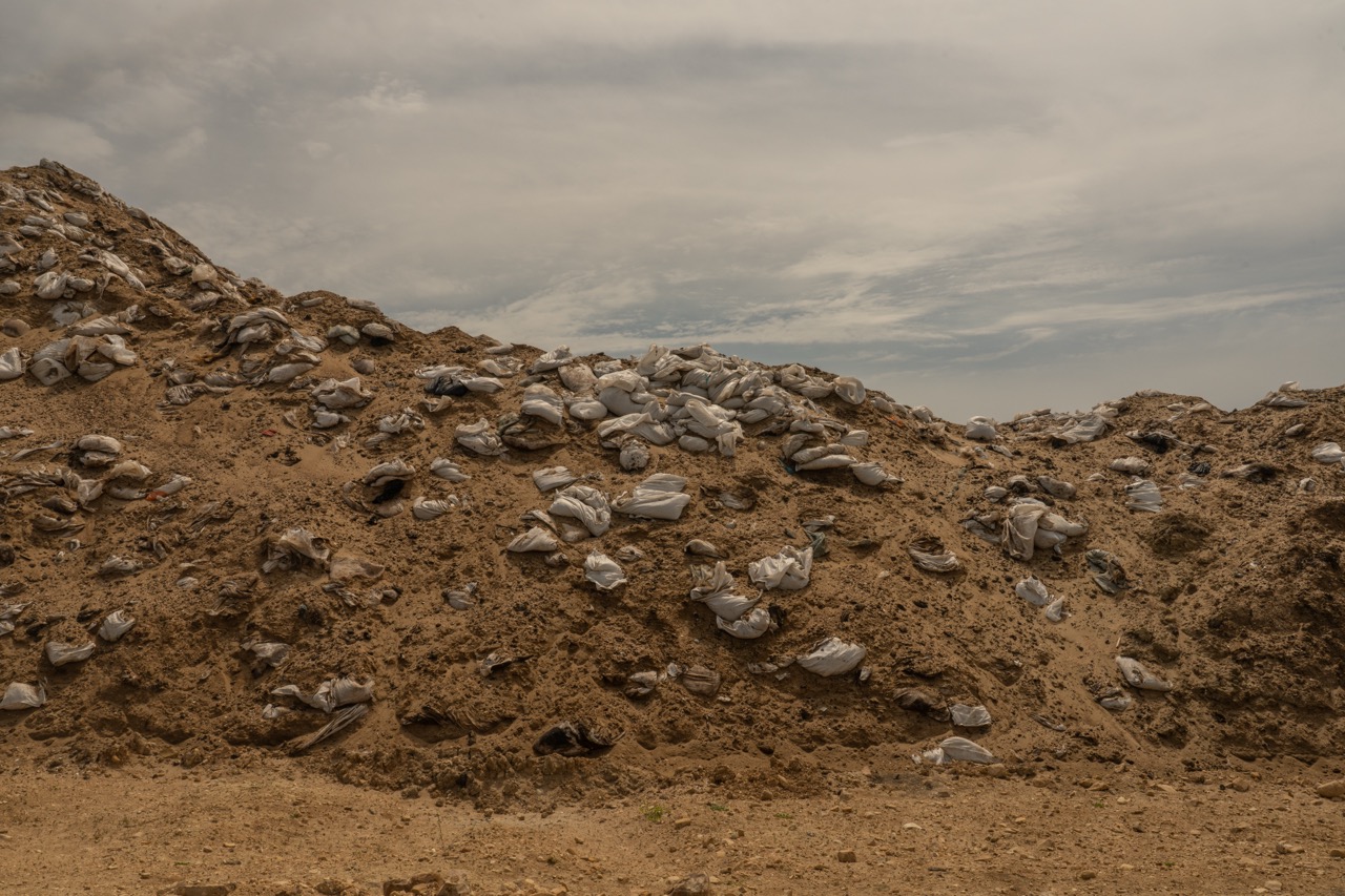 Groß (7 - Mountains of oil-contaminated sand at a specially created landfill near the city.jpeg
